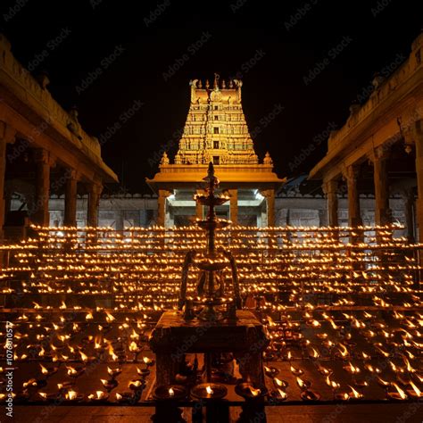 grand hindu temple adorned  thousands  oil lamps