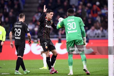 07 Florian Sotoca 30 Brice Samba During The Ligue 1 Uber Eats Match