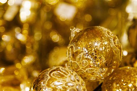 Gold Ornaments Sparkling by the Tree Background (Free) – Christmas HQ