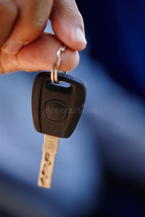 Unlock the Life You Deserve. Closeup Shot of a Man Showing You a Car ...