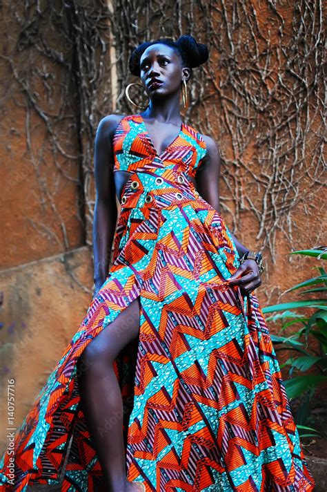 Young African girl in modern African print dress Stock Photo | Adobe Stock