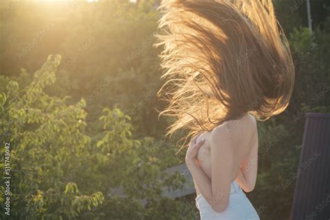 Sexy Nude Woman With Beautiful Movement Hair Naked Sensual Girl With Bare Shoulders Spring