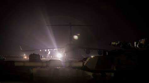 A U.S. Army M1A1 Abrams tank treads near a flight line - NARA & DVIDS ...