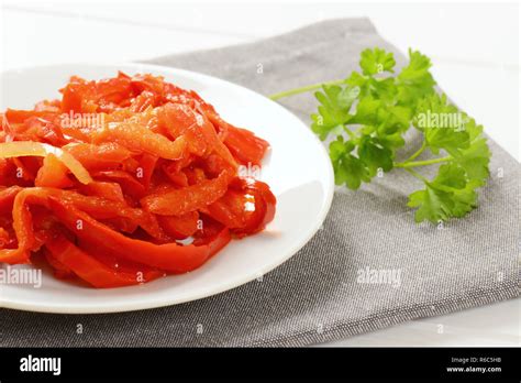 pickled red peppers Stock Photo - Alamy