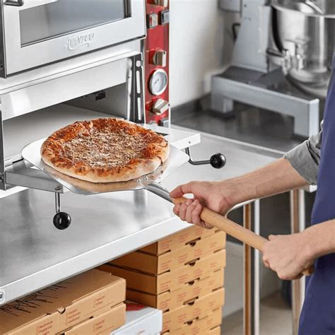 Aluminium Pizza Peel w/wooden handle - Abraham Distributors Ltd