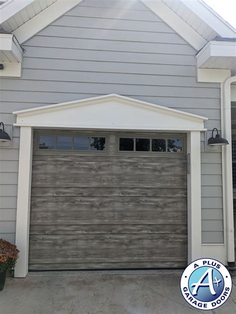 Weathered Grey Long Panel Garage Doors With Windows in Lehi, UT | A Plus Garage Doors