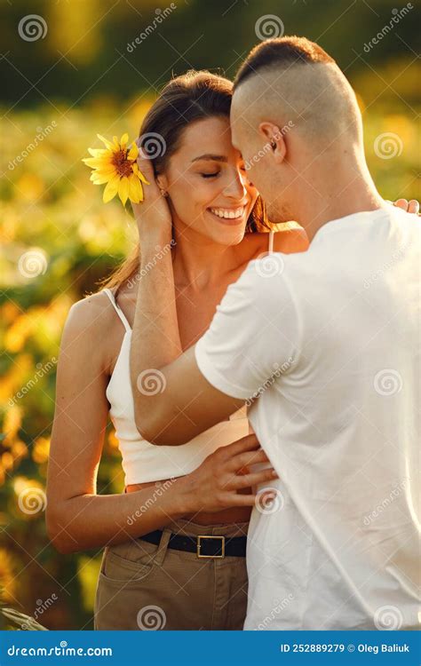 People Spend Time In A Sunflowers Field Stock Image Image Of Couple