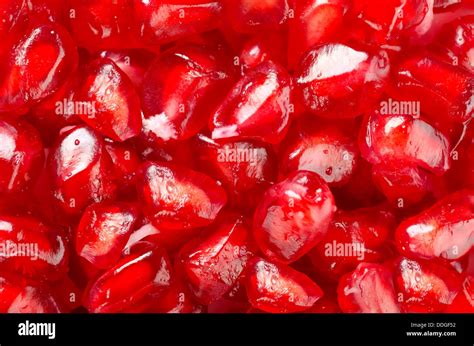 Pomegranate seeds background Stock Photo - Alamy