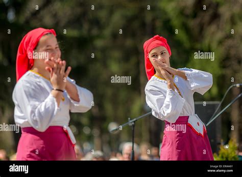 Two Female Bulgarian Folklore Dancers During The Traditional Folklore