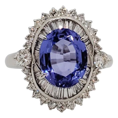 Tanzanite Oval And Diamond Baguette Cocktail Ring In Platinum At 1stDibs