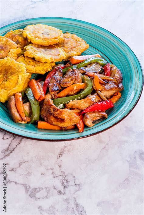 Chopped Steak Or Bistec Picao And Patacones Or Tostones Are Fried Green