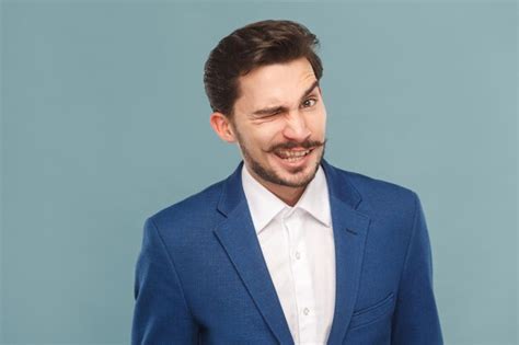 Premium Photo Portrait Of Smiling Mid Adult Man Against Blue Background