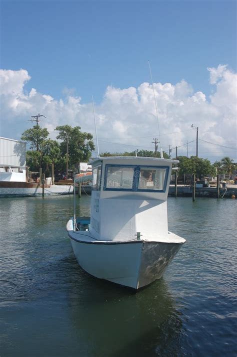 Fishing boat on water stock photo. Image of sunny, water - 328270