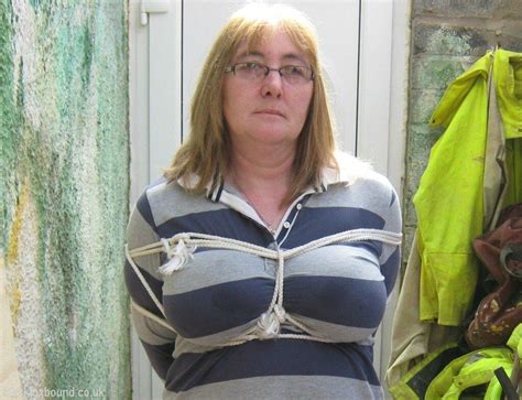 Mature Woman Is Silenced With A Gag While Her Tits Are Tied Up With
