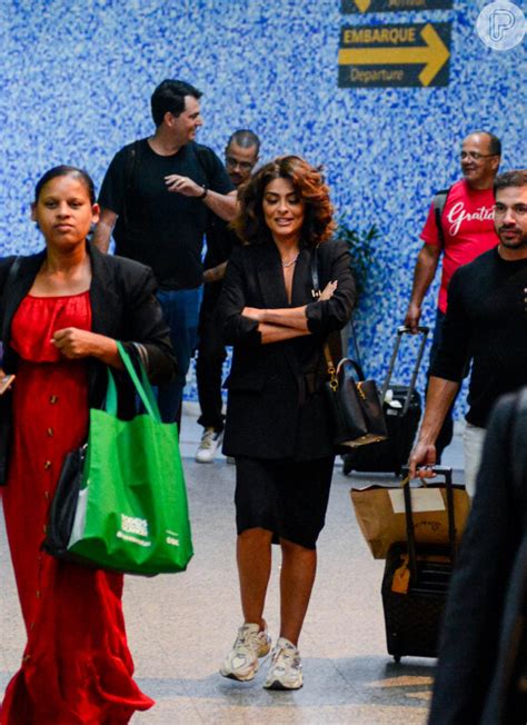 Juliana Paes combina bolsa de R 25 mil tênis de corrida e blazer