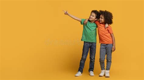 Two Black Kids Pointing Isolated Stock Photos Free And Royalty Free