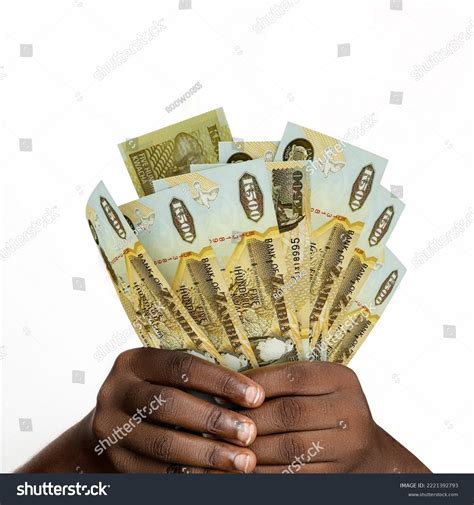 Black Hands Holding Zambian Kwacha Notes Stock Photo