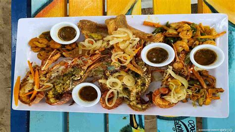 Why Is Everyone Stopping At This Seafood Restaurant On The Beach Kareem S Quest