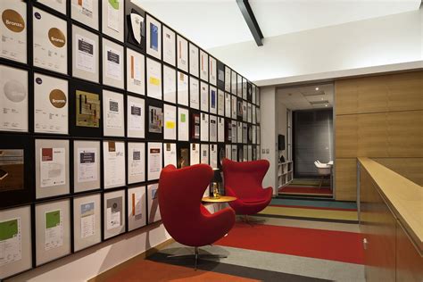 Best Design Awards certificates on display | Display wall design ...