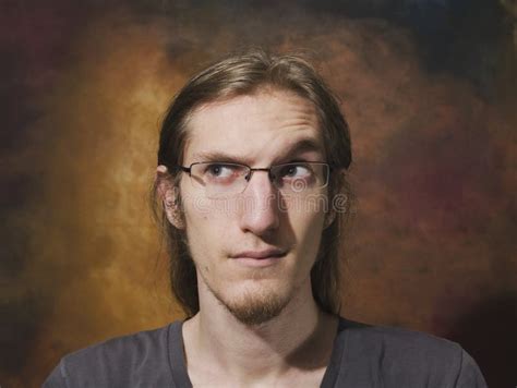 Young Man With Raised Eyebrow Stock Photo Image Of Curious Long