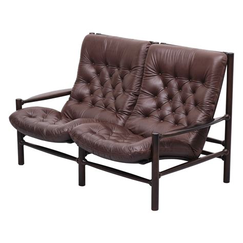 Two Seater Sofa Upholstered With Patinated Brown Leather By Arne