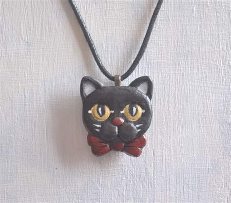 Black Cat Pendant. | Cat pendants, Pendant, Polymer clay magnet