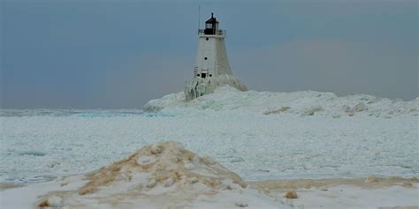 Frozen Lake Michigan at Ludington Photograph by Dave Zuker - Fine Art ...