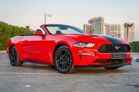 Rent a Ford Mustang Convertible Red • AL MUSAFIR