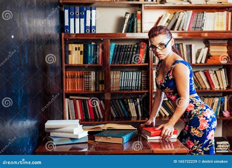 A Woman Sits At A Desk Book Librarian Education Stock Image Image Of