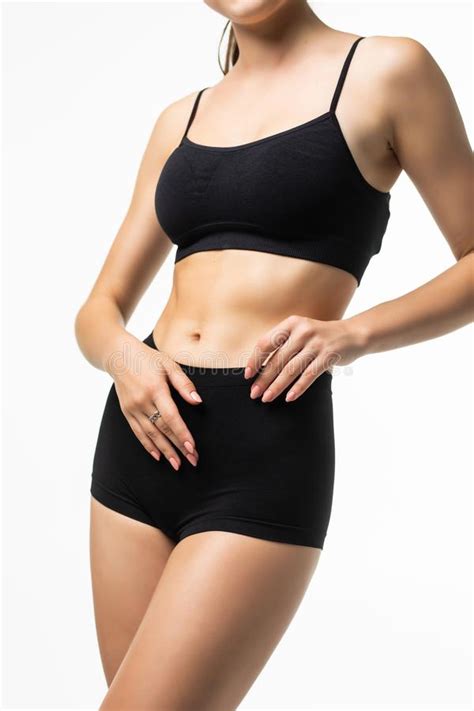Fitness Woman With A Beautiful Body In Black Lingerie Isolated On White Background Stock Image