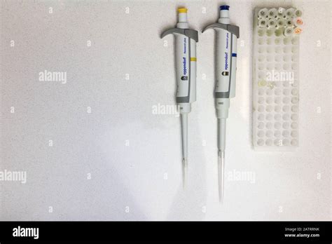 Chemical Equipment Are On The White Background Automatic Pipettes