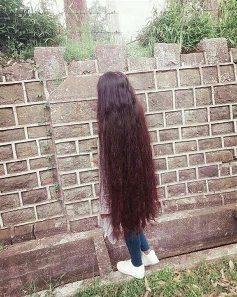 Image May Contain One Or More People And Outdoor Long Hair Styles