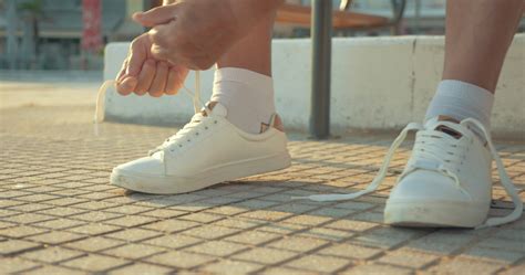 Mature Couple Lacing Running Shoes Before Jog Stock Video At Vecteezy