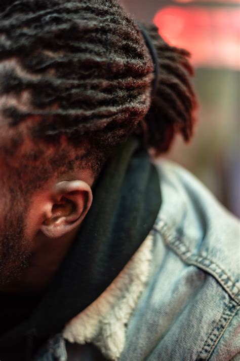 Unrecognizable bearded black man with dreadlocks · Free Stock Photo