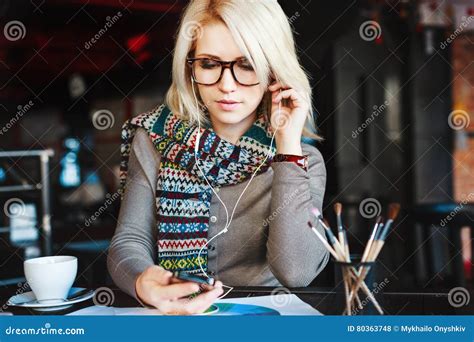 Blonde Girl With Mobile Phone And Headphones Stock Photo Image Of Happiness Activity