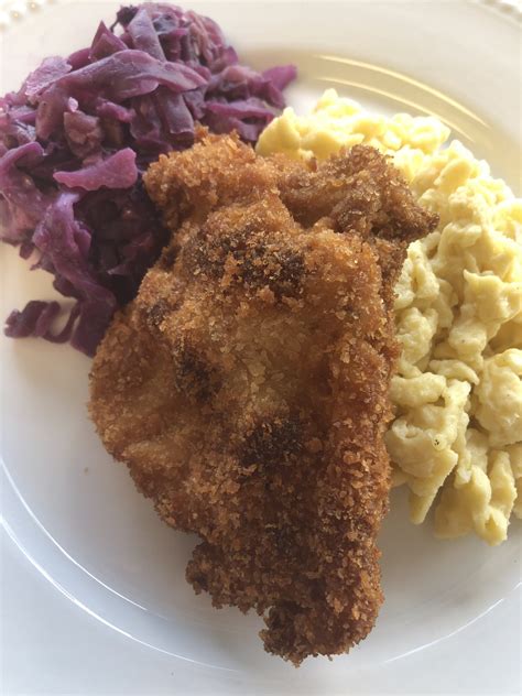 Pork Schnitzel Breaded Pork Cutletsspaetzlebraised Red Cabbage With