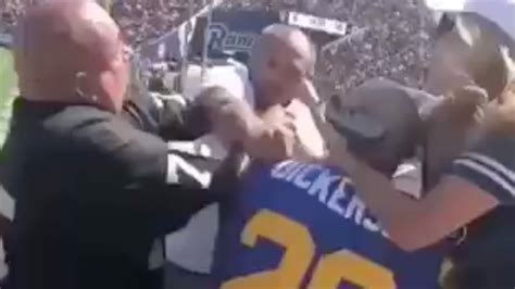 Rams Fan Violently Tossed Over Railing During Crazy Brawl With Raiders