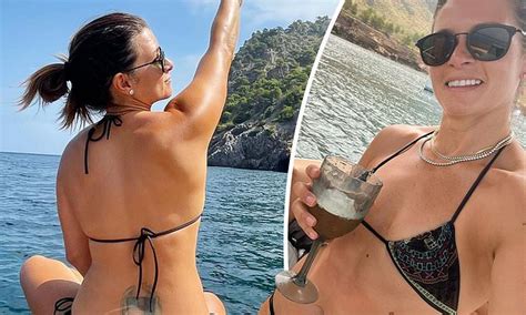 Danica Patrick Displays Her Toned Body In A Bikini That Exposes