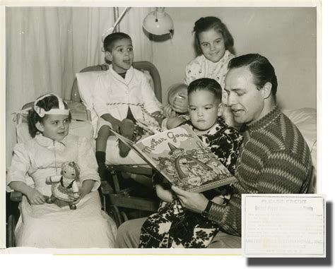 Original photograph of Marlon Brando reading to children | Marlon