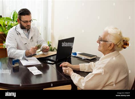 Private Medical Practice A Doctor With A Patient In The Doctors