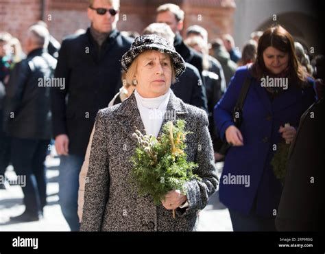 Vilnius April A Woman Holds Palm Products To