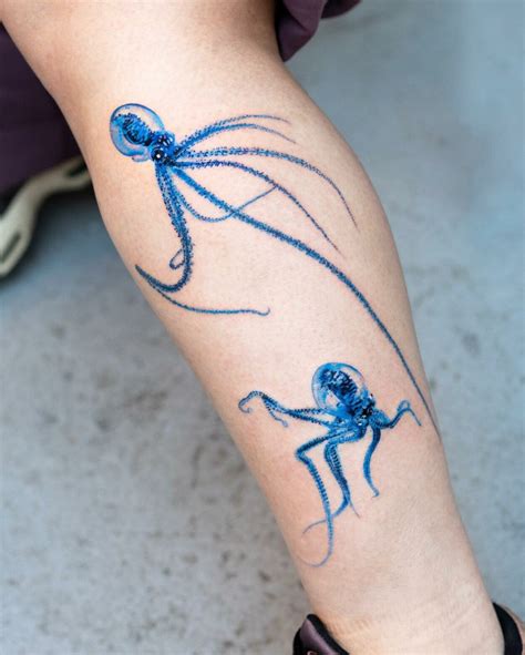 Stunningly realistic blue tattoos by Pokhy — Visualflood Magazine