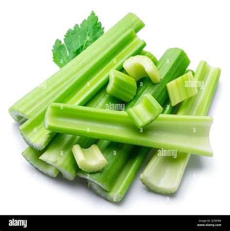 Pile of celery ribs isolated on white background Stock Photo - Alamy