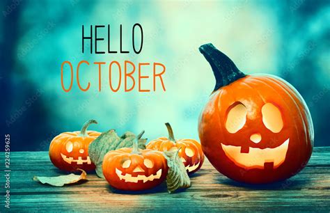 Hello October With Pumpkins On A Spooky Forest At Night Stock Photo