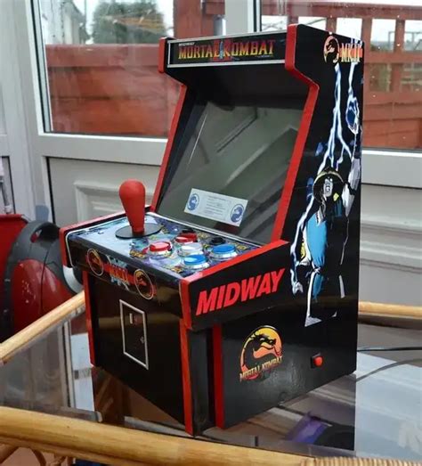 Mini Arcade Cabinet: Retro Gaming Fun On-the-Go.