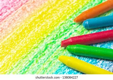 Five Crayons Drawing Rainbow Horizontal Stock Photo