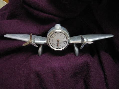 Vintage Airplane Clock With Alarm Sarsaparilla Cast Aluminum Etsy Airplane Clock Vintage