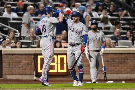 Mitch Garver homers, scores huge insurance run as Texas Rangers win again - Sports Illustrated ...