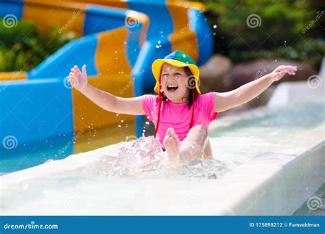 Kids On Water Slide In Aqua Park Summer Vacation Stock Photo Image