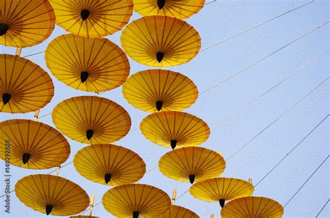 yellow umbrella. Stock Photo | Adobe Stock